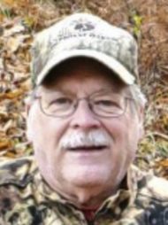 Dennis E. Houck
