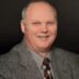 Charles E. “Chas” McFalls